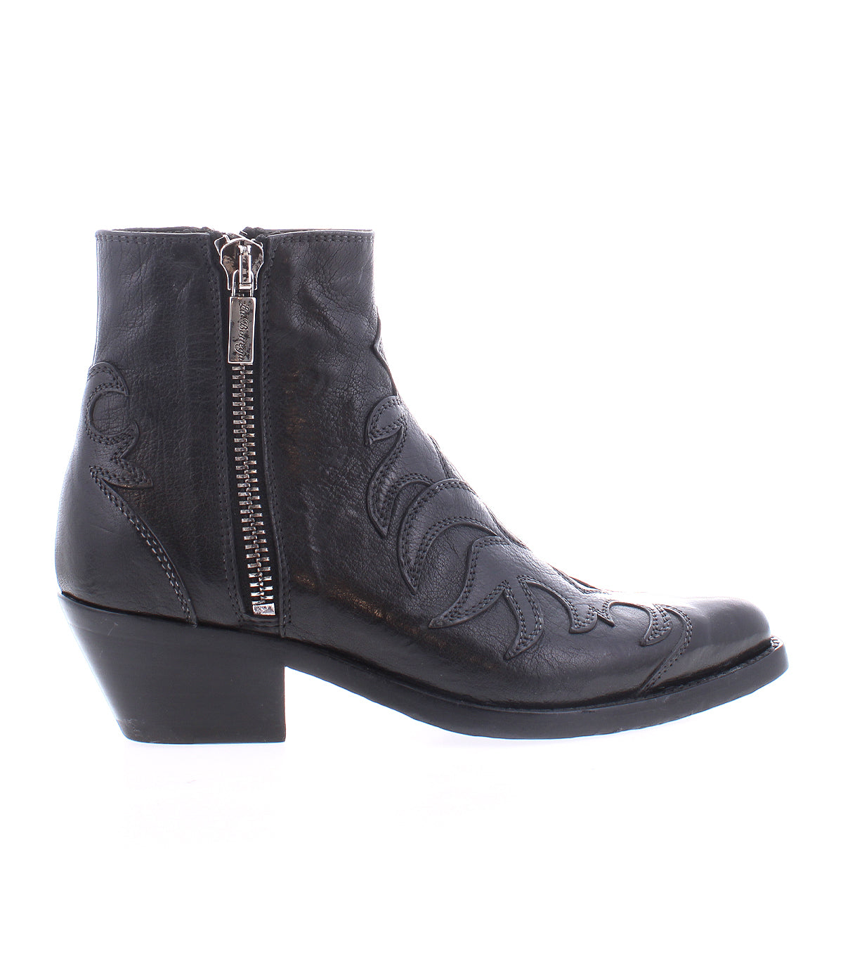 The Tentativa boot by Bed|Stü is a handcrafted Italian black leather ankle boot featuring a side zipper, decorative upper stitching, and a low angled stacked heel; shown in profile on a white background, it exudes sophisticated style with subtle vintage Western influences.