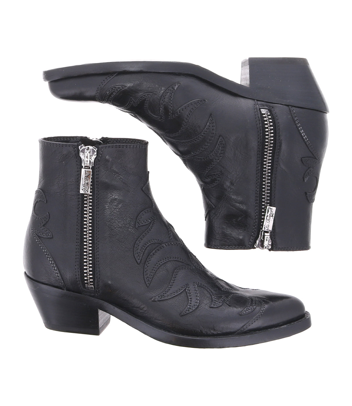 Pair of black Tentativa ankle boots by Bed|Stü, crafted in leather with side zippers, a stacked heel, and decorative stitching along the sides for a vintage Western-inspired look—displayed from side and bottom views.