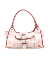 The Bed|Stü Unbending handbag in beige washed leather features red trim, shoulder straps, a front buckle pocket, and a small logo patch on the bottom right corner—an ideal stylish work-bag—shown against a white background.