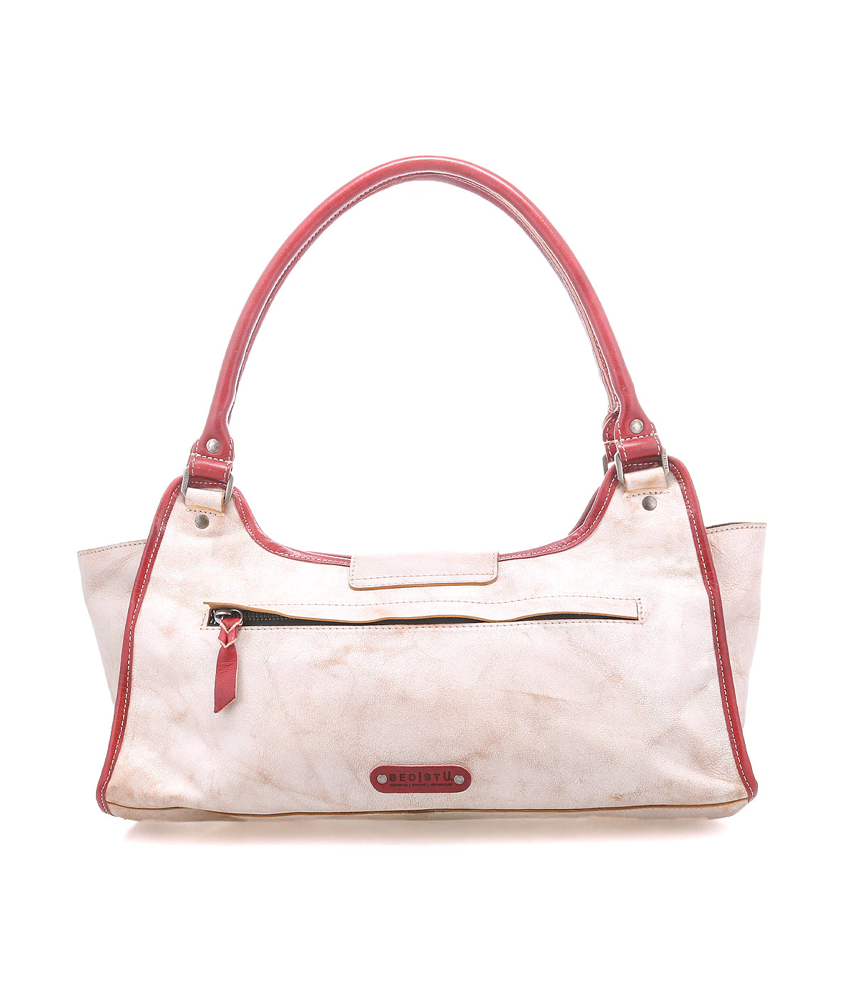 The "Unbending" shoulder bag by Bed|Stü is crafted from beige washed leather with striking red handles and trim. It features a front zipper pocket and a small brand tag, photographed against a white background—an elegant choice for a work bag.