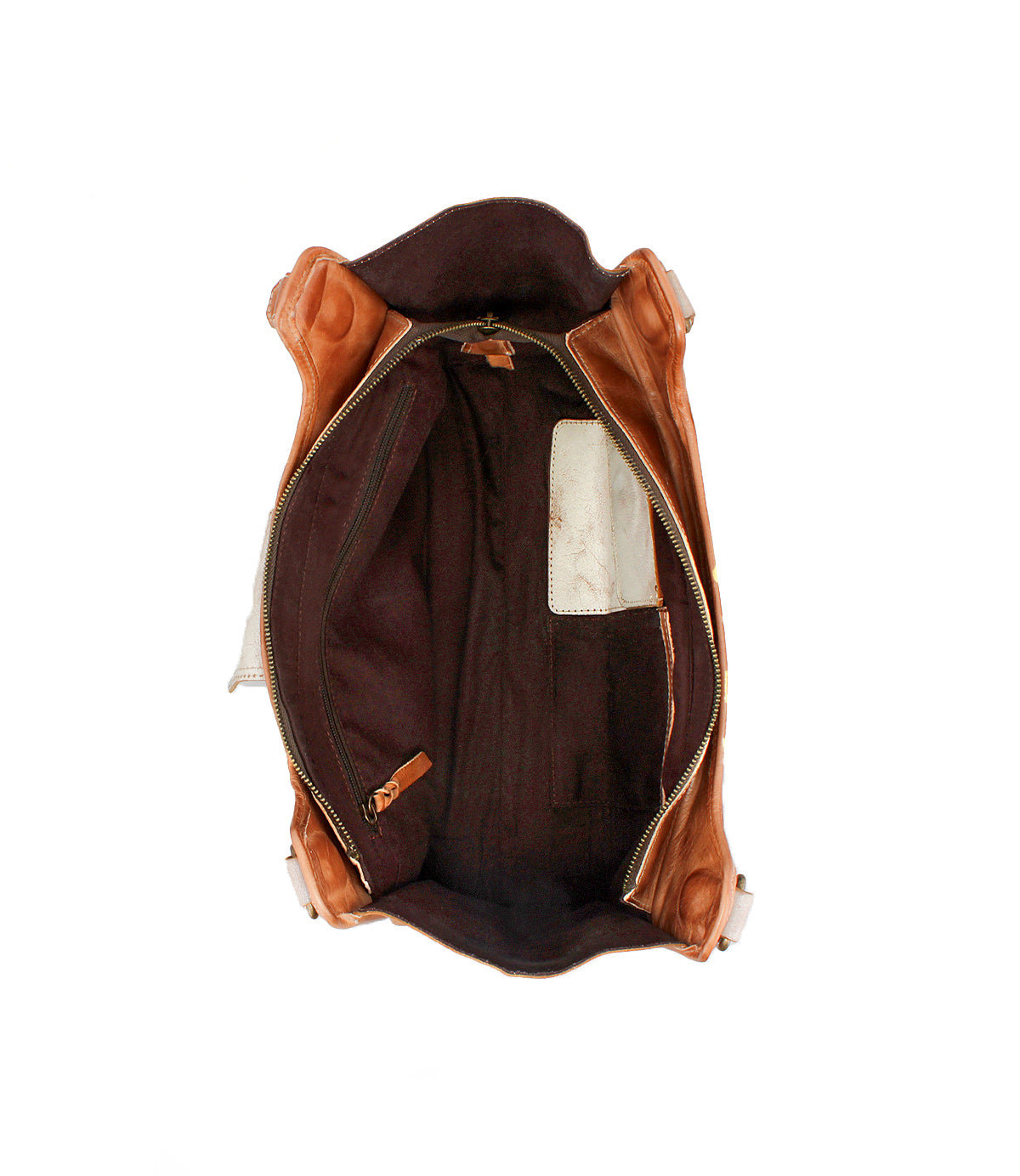 Top view of the Bed|Stü Unbending shoulder bag in brown washed leather, featuring a spacious interior with a dark lining, an internal zipper pocket, and a white rectangular patch on one side.