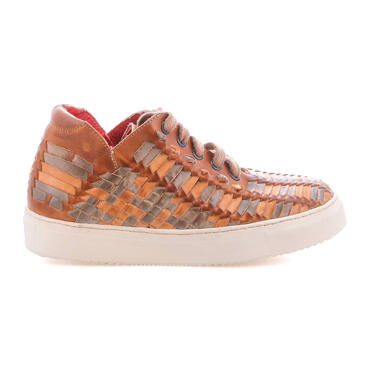 The Unwavering sneaker by Bed|Stü is a handwoven leather design in tan and gray, featuring a white sole, brown laces, and a striking red interior. Shown in profile against a white background, its dimensional woven pattern brings unique character to these comfortable sneakers.
