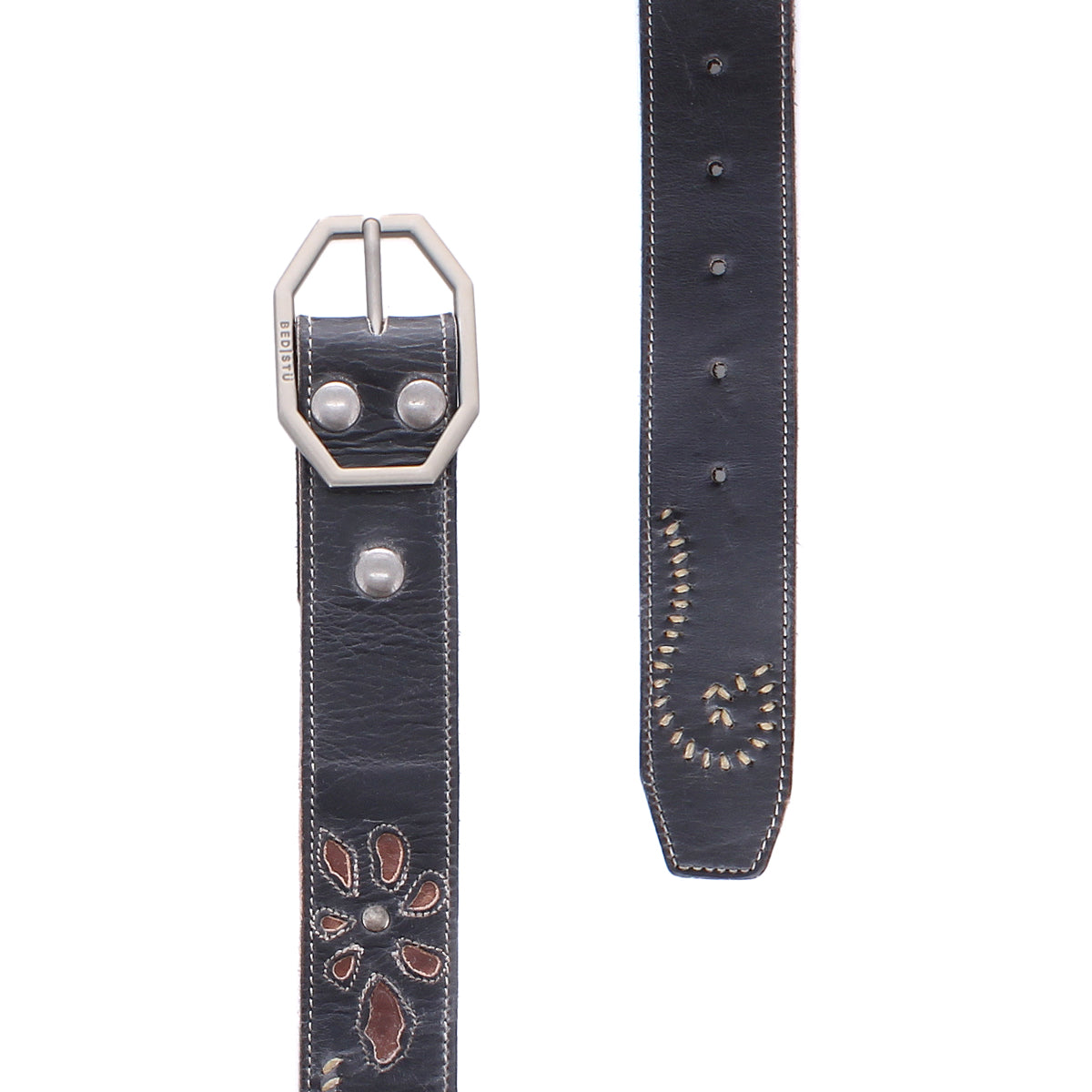 Bed|Stü's Upswing II is a black leather belt with a silver buckle, featuring a floral cutout design, stitched edges, and metal rivet accents—an artisanal accessory perfect for elevating any look.