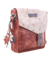 Introducing the Bed|Stü Venice Beach—a crossbody bag crafted from brown and beige full-grain leather, featuring a buckle closure, flap top, adjustable strap, and star-shaped leather charms adorning the side.