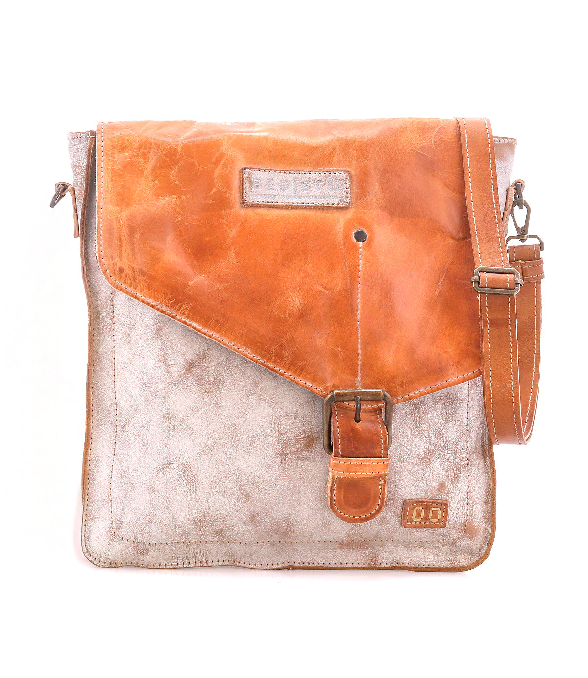 Introducing the Venice Beach crossbody bag by Bed|Stü, crafted from full-grain leather with a striking two-tone design. This piece features a tan flap, prominent buckle closure, adjustable strap, and visible stitching, beautifully photographed against a white background.