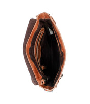The Venice Beach crossbody bag by Bed|Stü is crafted from full-grain leather and fabric in an open brown design, revealing visible inner compartments—including a zippered pocket and branded tag—when viewed from above. An adjustable strap provides versatile carrying options.