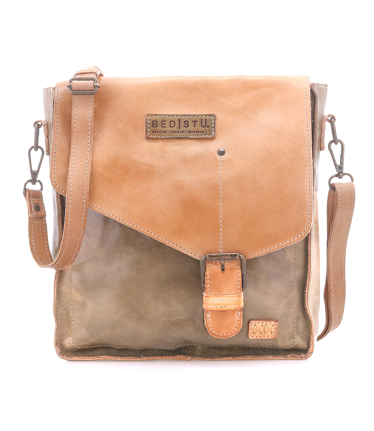 The Venice Beach crossbody bag by Bed|Stü features brown and tan full-grain leather, an adjustable strap, a front buckle closure, and a "Bed|Stü" label on the flap, photographed against a white background.