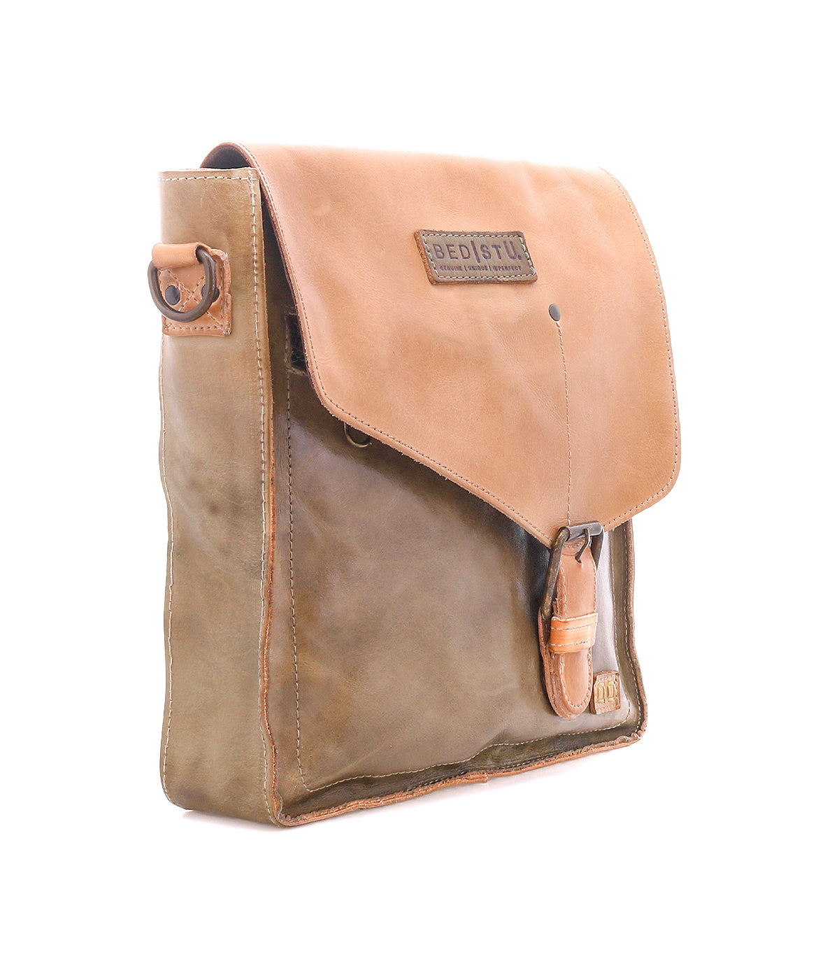 Introducing the Venice Beach crossbody bag from Bed|Stü, crafted from rich brown full-grain leather. This satchel features a front flap with buckle closure and the Bed|Stü label on the top flap. Photographed on a white background, the stylish Venice Beach bag offers an adjustable strap for enhanced comfort and versatility.