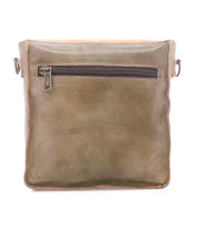 The Bed|Stü Venice Beach is a square olive green full-grain leather shoulder bag featuring a front zippered pocket and metal rings for its adjustable strap, displayed against a white background.
