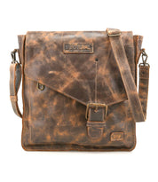 The Venice Beach messenger bag by Bed|Stü is crafted from distressed brown full-grain leather and features an adjustable strap for versatile crossbody wear, a front buckle closure, and embossed branding on the flap.