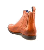 Introducing the Verrocchio Chelsea boot by Bed|Stü—a handcrafted brown leather boot featuring side zippers, a low heel, and a pull tab at the back for easy wear. Ideal for everyday use, it's shown from a rear side angle against a white background.