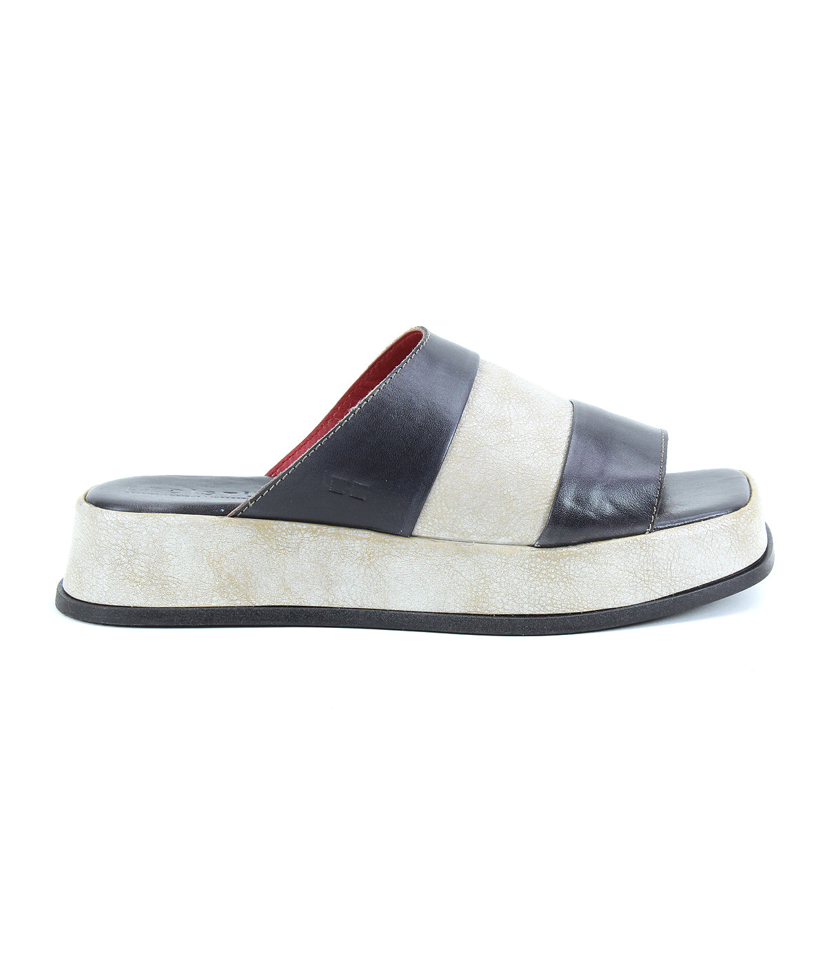 The Bed|Stü Vext is a platform slide sandal with a substantial leather-wrapped sole and two wide, dark brown leather straps, displayed in a side profile view against a plain white background.