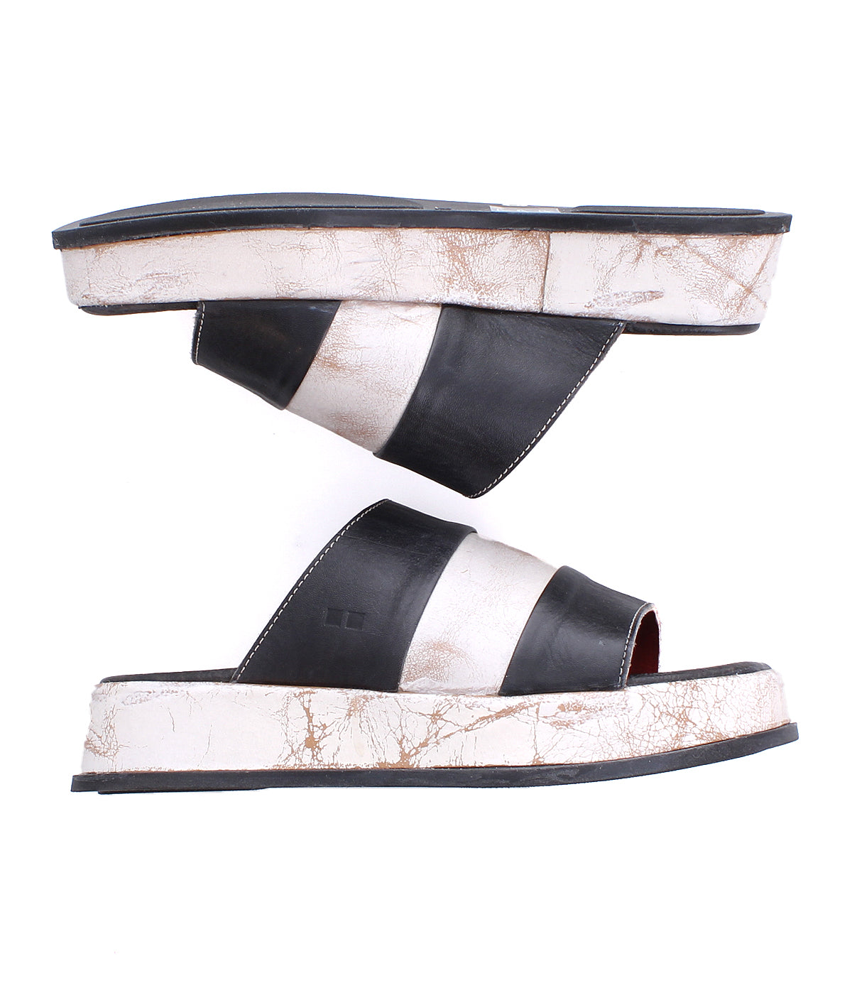 A pair of Bed|Stü Vext platform slide sandals featuring thick, black and white striped leather-wrapped soles are displayed side by side on a white background.