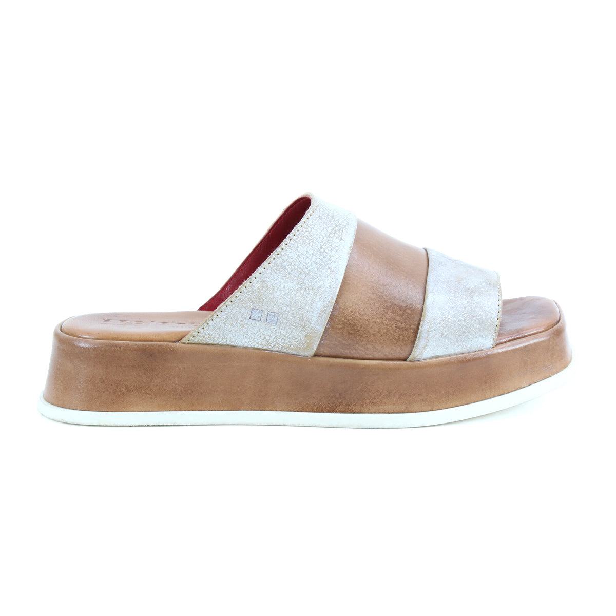 The Bed|Stü Vext platform slide sandal is displayed in a side profile against a white background, showcasing its brown and beige colorway, wide strap, thick leather-wrapped sole, and signature elevated design.