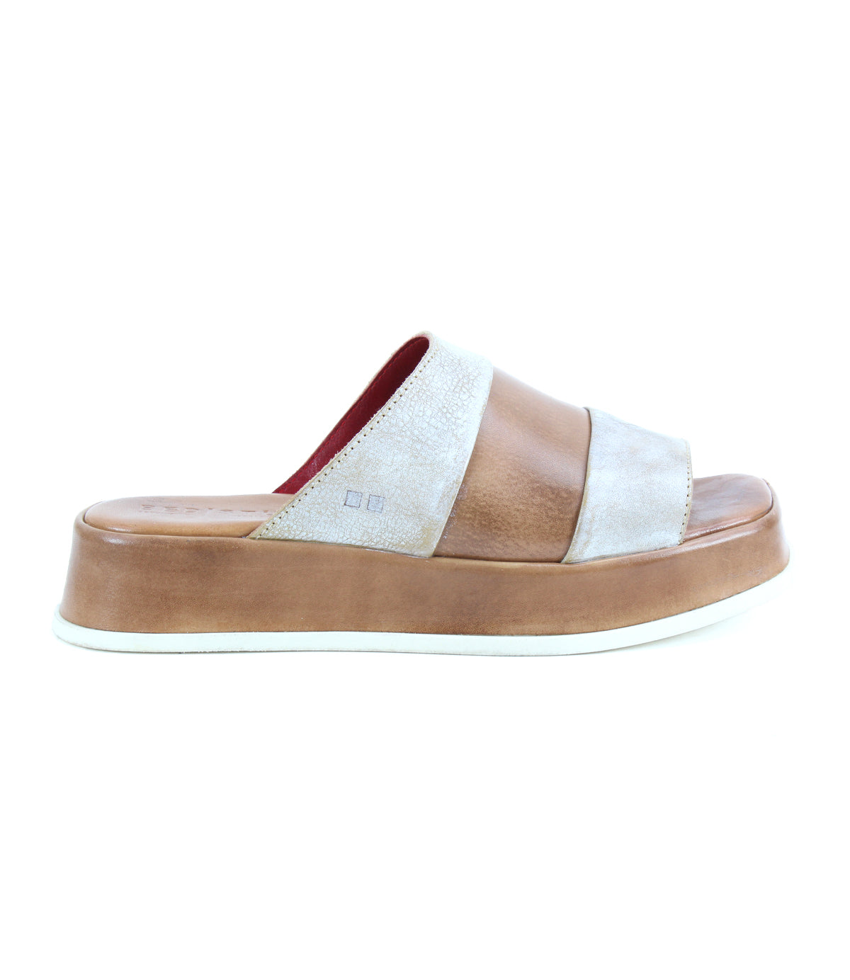 The Bed|Stü Vext platform slide sandal is displayed in a side profile against a white background, showcasing its brown and beige colorway, wide strap, thick leather-wrapped sole, and signature elevated design.