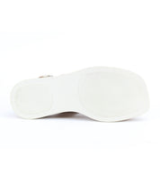 The image displays the white rubber sole of the Bed|Stü Vice strappy sandal, photographed from the bottom against a plain white background.