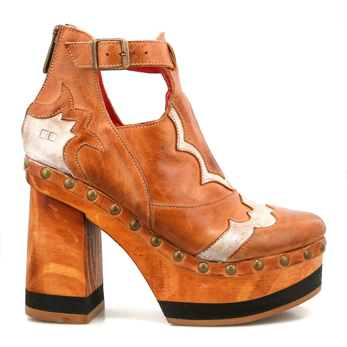 Introducing the Viretta by Bed|Stü—a brown leather platform shoe featuring silver accents, a chunky, handcrafted wooden heel, brass studs, a zipper closure, and a buckled ankle strap.