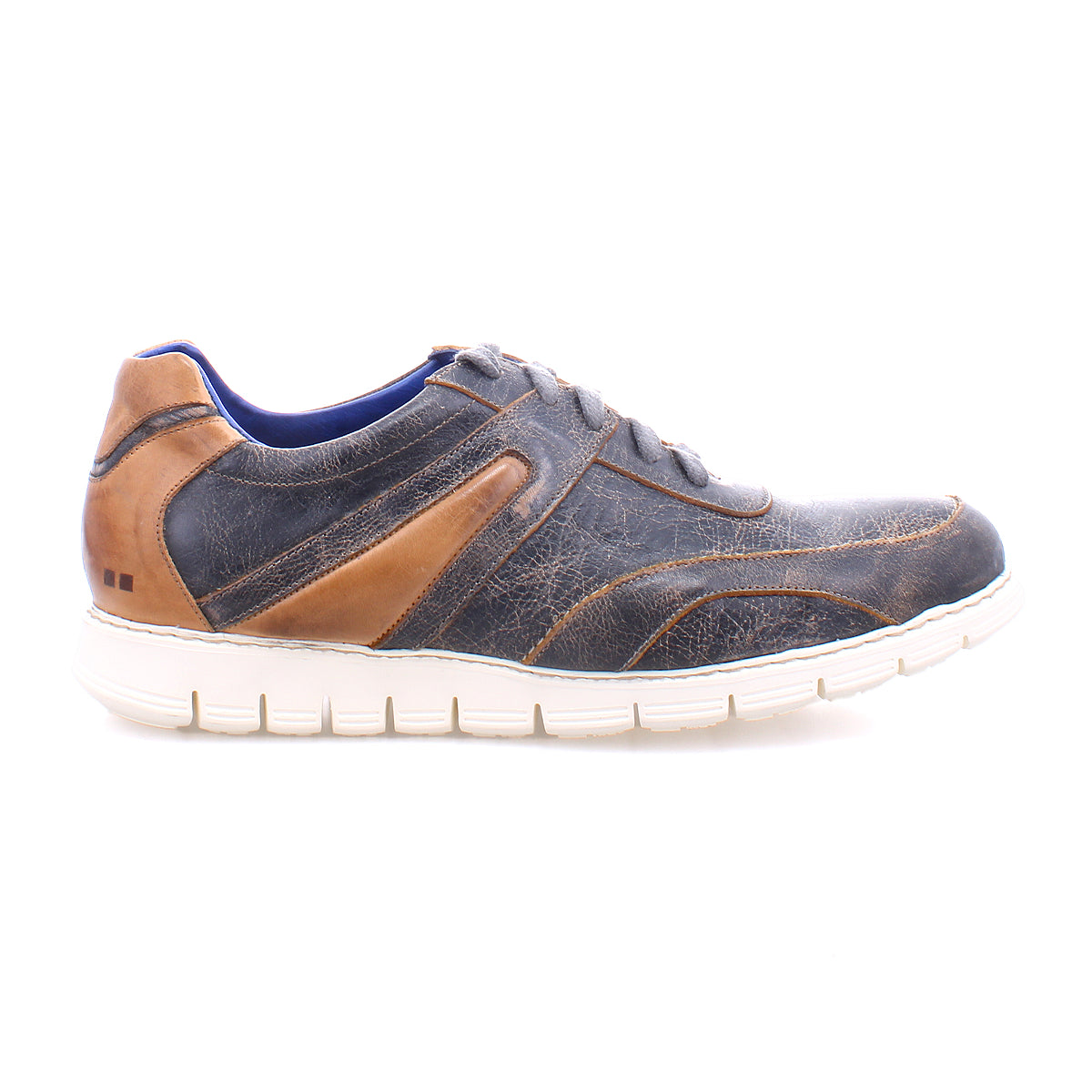 The Bed|Stü Wardell is a casual men's lace-up sneaker featuring a layered leather upper in dark blue and brown hues and a white cushioned sole, shown from the side against a white background.