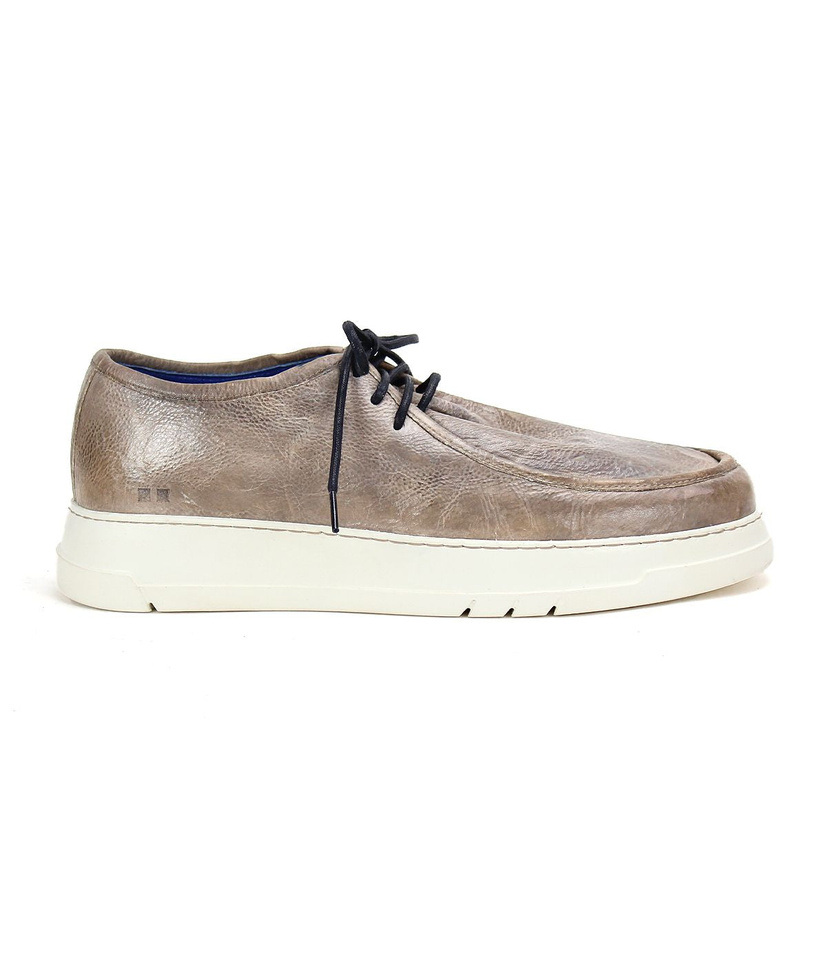 The Webmaster sneaker by Bed|Stü is displayed in side profile on a plain white background, featuring a taupe leather moc-toe design with black laces and a white rubber sole.
