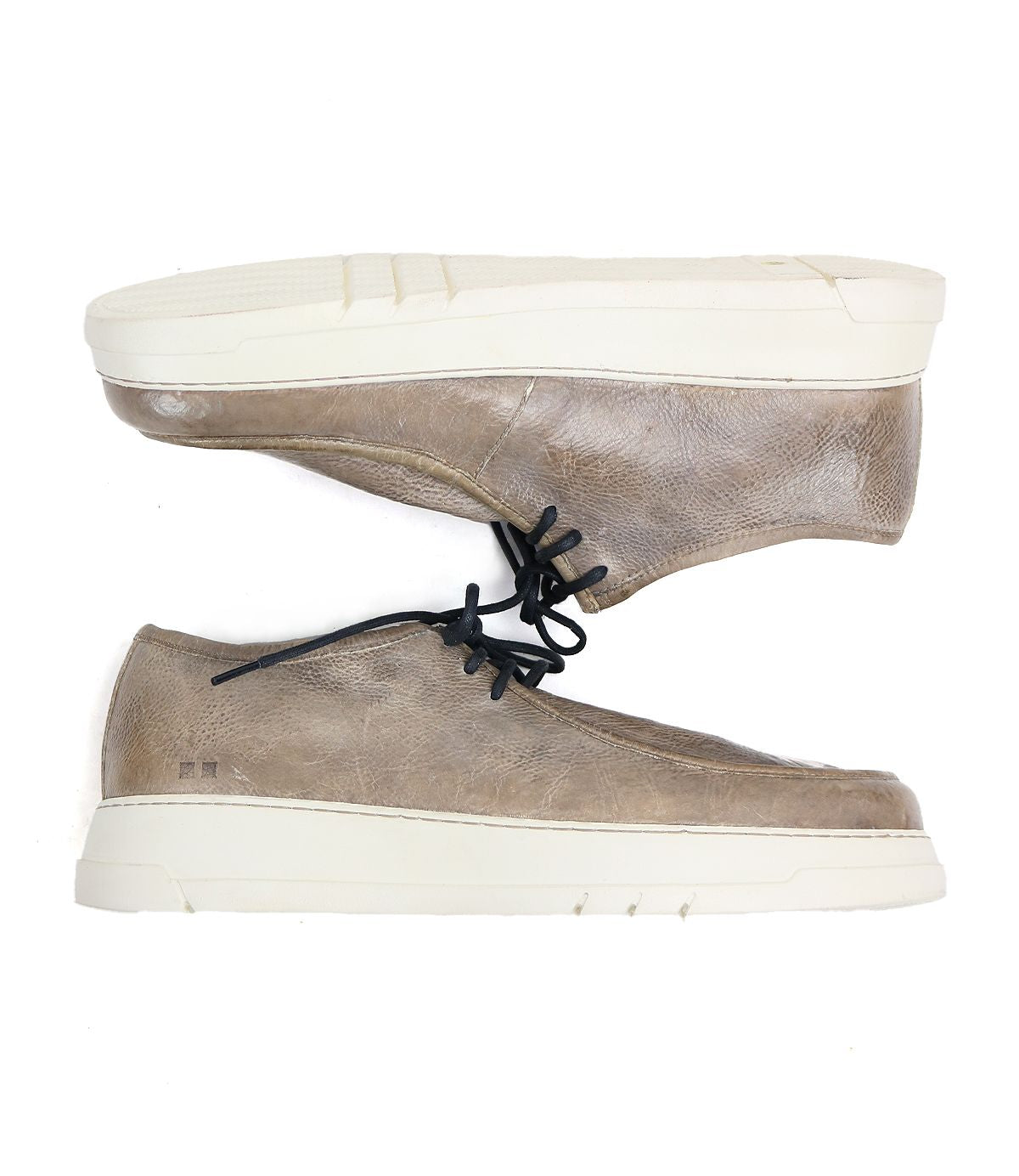 Two beige leather Webmaster moc-toe sneakers by Bed|Stü, featuring white soles, are stacked horizontally—one facing left and the other right—against a white background. Their lace-up design delivers both style and support, making these shoes comfortable for all-day wear.