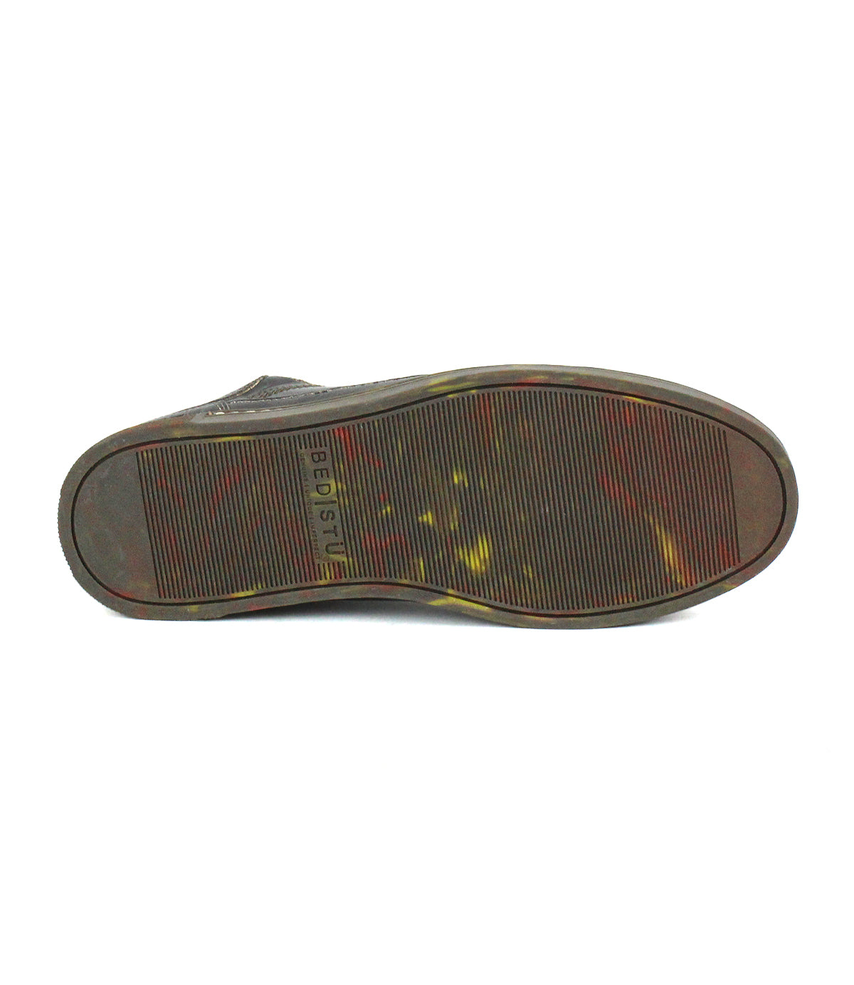 The sole of the Bed|Stü Wizard brown low-profile leather sneaker—with fine ridges, light scuff marks, and "BED|STU" branding near the heel—features subtle crossover stitching and is showcased against a white background.