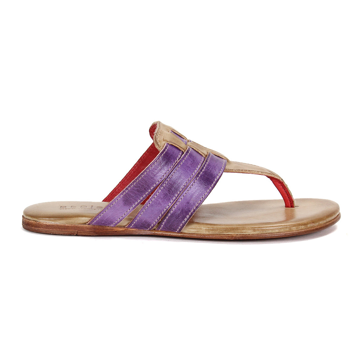 The Yoli sandal by Bed|Stü features a tan sole, a red toe strap, and purple and tan crisscross woven upper straps, displayed in a side profile view.