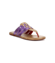 The Yoli leather thong sandal by Bed|Stü features a tan sole, purple leather straps with a toe loop, an open back design, and a cushioned insole for lasting comfort.