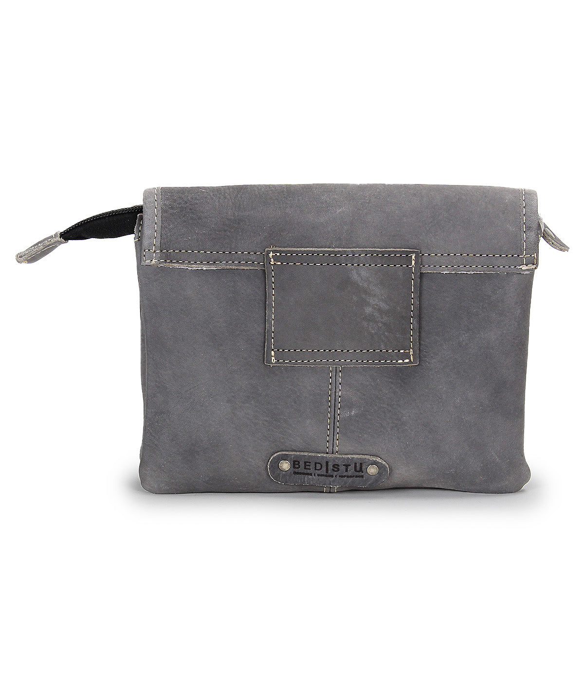 Introducing the Ziggy by Bed|Stü—a gray leather clutch handcrafted from supple leather with visible stitching, featuring a flap closure, a small front patch, and a signature Bed|Stü logo tag at the bottom center. This versatile bag can be carried as a crossbody or tucked inside your favorite belt bag.