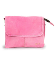 The Ziggy by Bed|Stü is a small, rectangular crossbody bag crafted from pink suede leather, featuring a luxurious feel, minimal front stitching detail, and a flap closure.