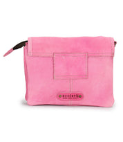 A pink supple leather crossbody bag called the Ziggy by Bed|Stü, featuring a front flap, exposed stitching, a small square pocket, and a "Bed|Stü" logo patch with two rivets.