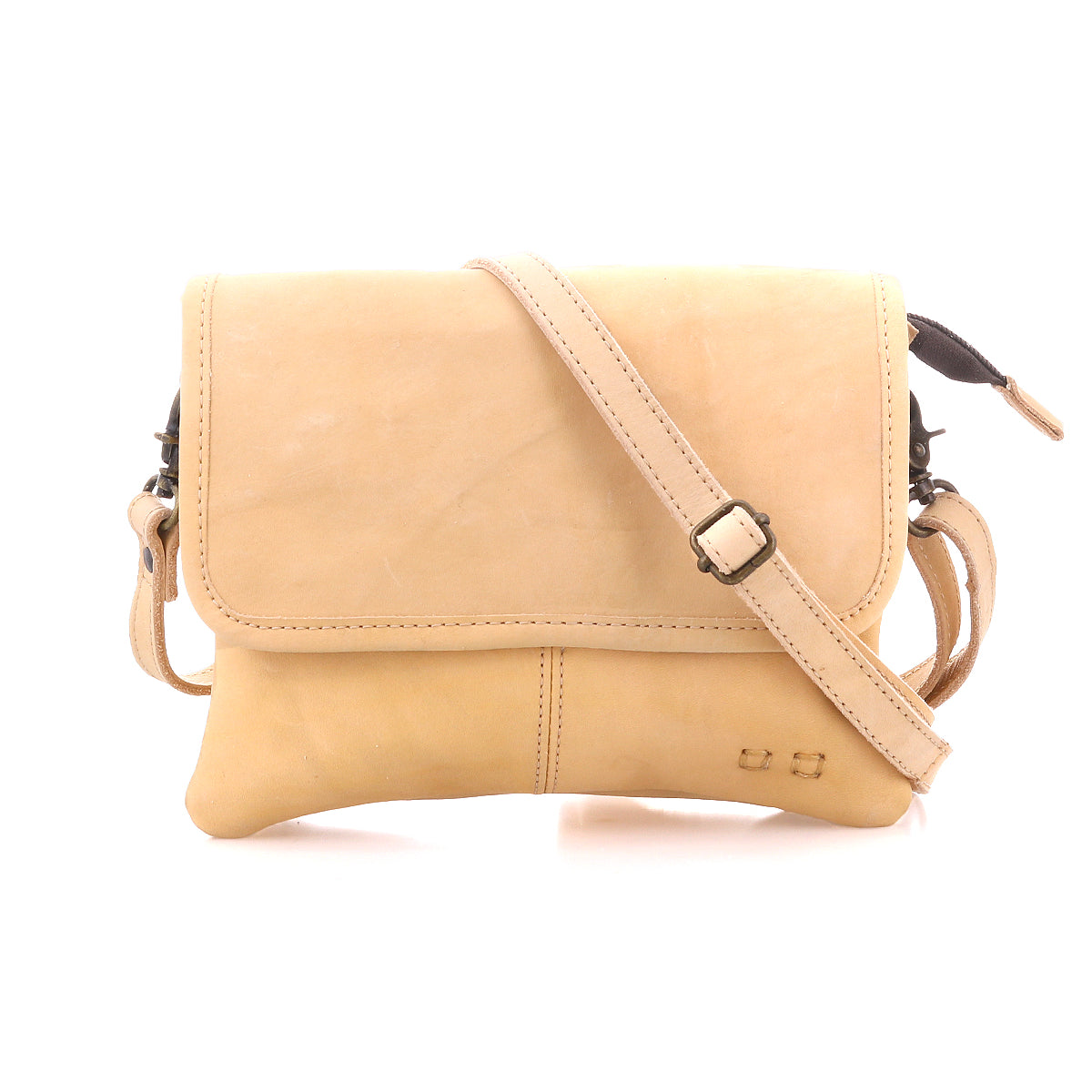 Introducing the Ziggy crossbody bag by Bed|Stü, crafted from light tan supple leather and featuring a front flap, adjustable shoulder strap, and minimal stitching details, shown against a white background.