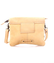 Light tan supple leather crossbody bag, Ziggy by Bed|Stü, featuring a front pocket, metal hardware, and a “Bed|Stü” logo plate at the bottom center.