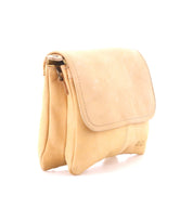 The Bed|Stü Ziggy is a light tan, supple leather crossbody bag featuring a flap closure, two compartments, and visible stitching, shown against a white background.
