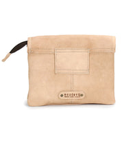 The Ziggy by Bed|Stü is a beige leather pouch featuring a zipper and a small rectangular patch on the front. Crafted from supple leather, this versatile accessory can be worn as either a belt bag or a crossbody bag. The "Bed|Stü" logo appears on a metal-accented label at the bottom.