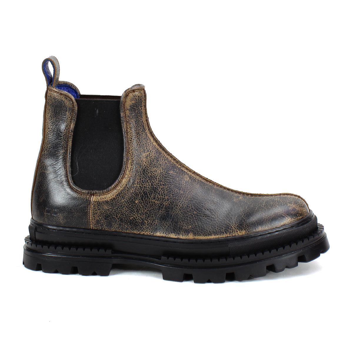 The Bed|Stü Accelerate is a single brown distressed leather Chelsea boot, featuring black elastic side panels and a thick black lug outsole, shown in profile on a white background—blending classic style with a modern edge.