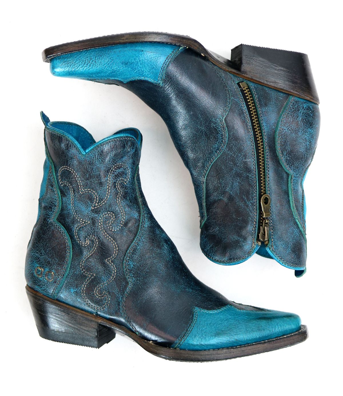 The Bed|Stü Ace boots are a pair of blue and turquoise Western boots crafted from full-grain leather, featuring decorative stitching and side zippers, shown from the side and bottom—a beautiful example of traditional boot making.