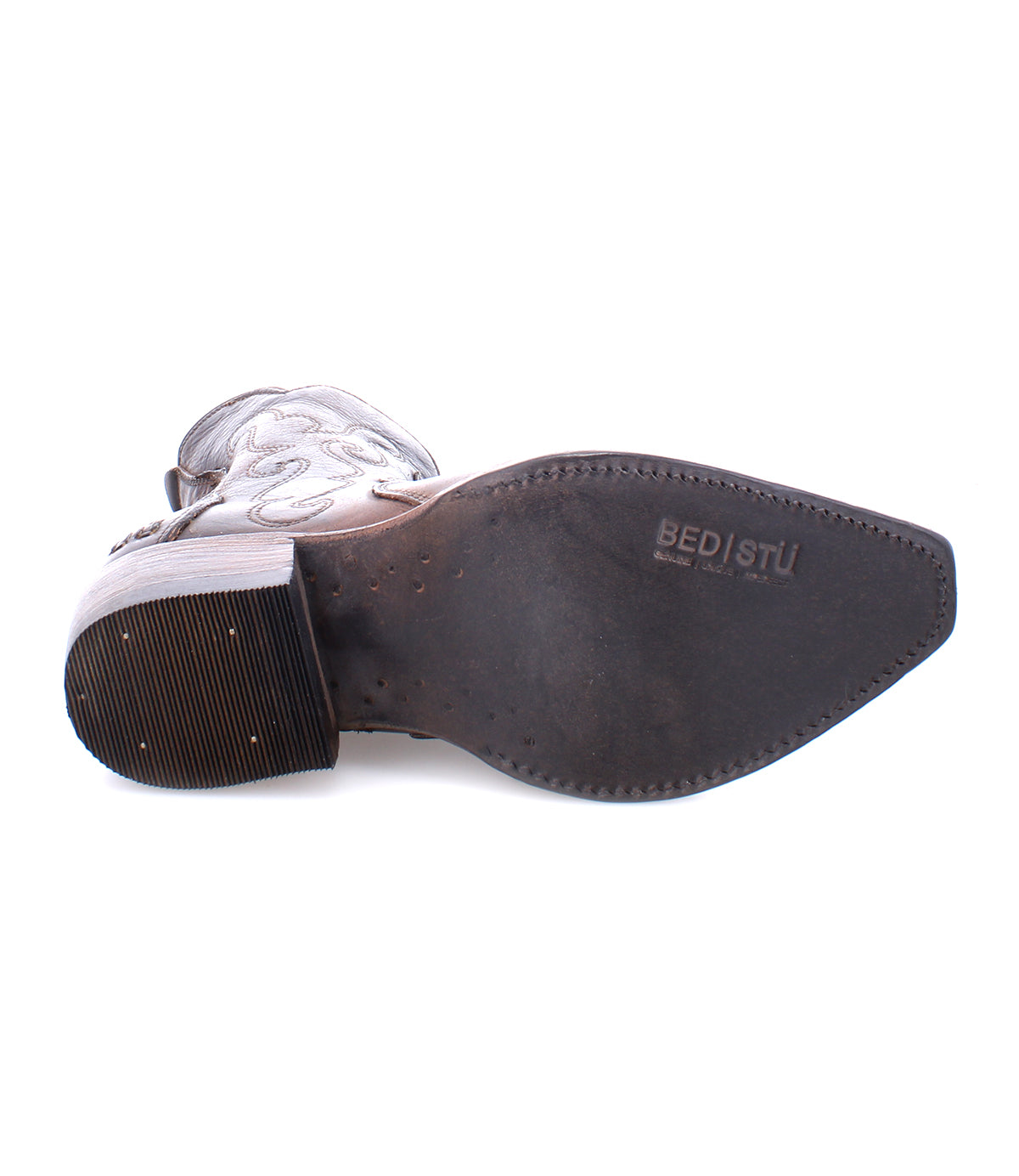 Bottom view of the Ace, a pointed-toe Western boot by Bed|Stü, with distinctive branding visible on the sole and detailed stitching on the upper, expertly handcrafted from rich full-grain leather using traditional boot making techniques.