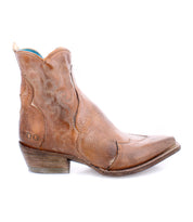 The Bed|Stü Ace is a single brown Western boot made from full-grain leather, shown in profile on a white background. It features decorative stitching, a pointed toe, and a stacked wooden heel.