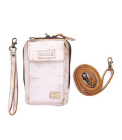The Alelike by Bed|Stü is a light beige leather phone pouch featuring a zipper closure, front pocket, and signature “BED|STÜ” label. Shown with removable wristlet and crossbody straps, this compact purse is ideal for keeping your travel essentials organized on the go.