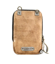 Compact and stylish, the Alelike small tan leather crossbody bag from Bed|Stü is perfect for carrying travel essentials. It features metal rings, a secure zipper closure, and a prominent "Bed|Stü" label on the front. With its detachable strap on the side, this purse is an ideal choice for your everyday adventures.