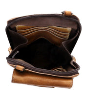 Open Alelike brown leather wallet by Bed|Stü, featuring visible card slots and compartments, shown from above with the zipper partially open—a perfect compact purse for keeping your travel essentials organized.