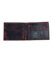 The Amidala by Bed|Stü is an open, empty black bifold leather wallet featuring red stitching and multiple card slots on both sides.