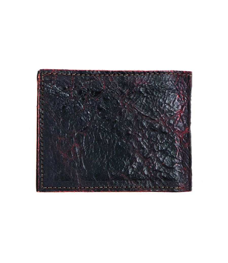 The Bed|Stü Amidala is a closed, textured black leather bifold wallet featuring prominent red stitching along the edges, displayed against a white background.