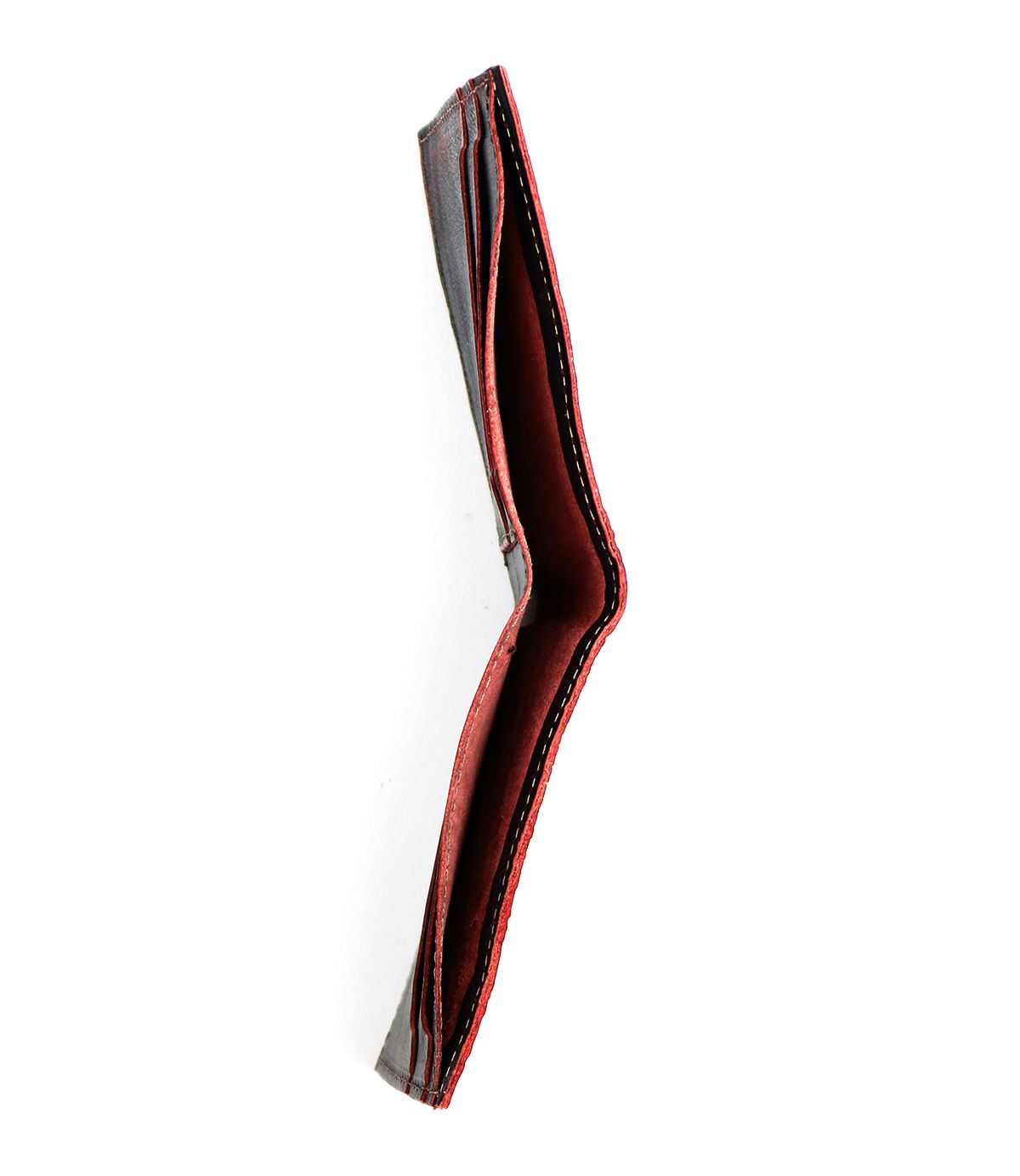 A top-down view of the Bed|Stü Amidala bifold wallet, crafted from red and black materials and shown open and empty against a white background.