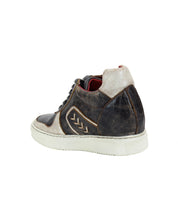 A single Bed|Stü Andromeda high-top sneaker featuring a dark brown and white leather upper, white rubber sole, and red lining, shown from an angle highlighting the outer side and back.