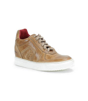 The Bed|Stü Andromeda is a tan leather high-top sneaker featuring a white rubber sole, beige laces, and red interior lining, displayed on a plain white background—a city-ready sneaker crafted for both style and comfort.