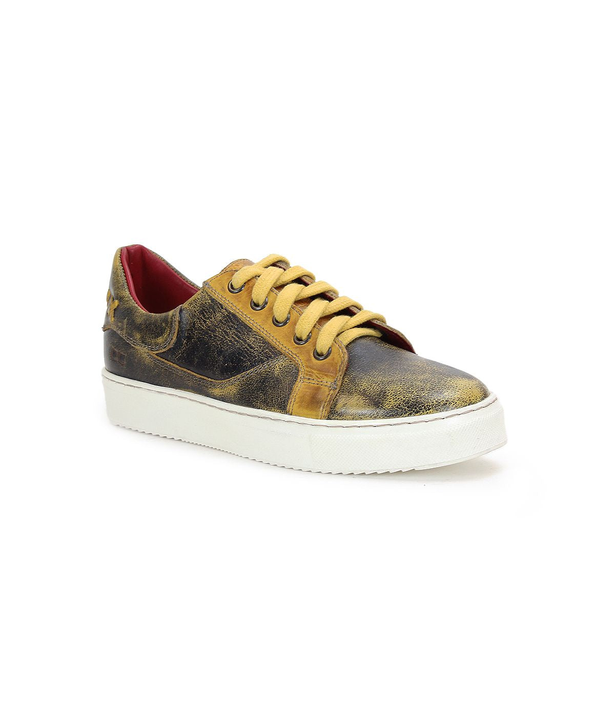 The Bed|Stü Azeli is a single yellow and black distressed leather sneaker with tan laces and a white sole, featuring a durable rubber outsole for all-day comfort, shown on a plain white background.