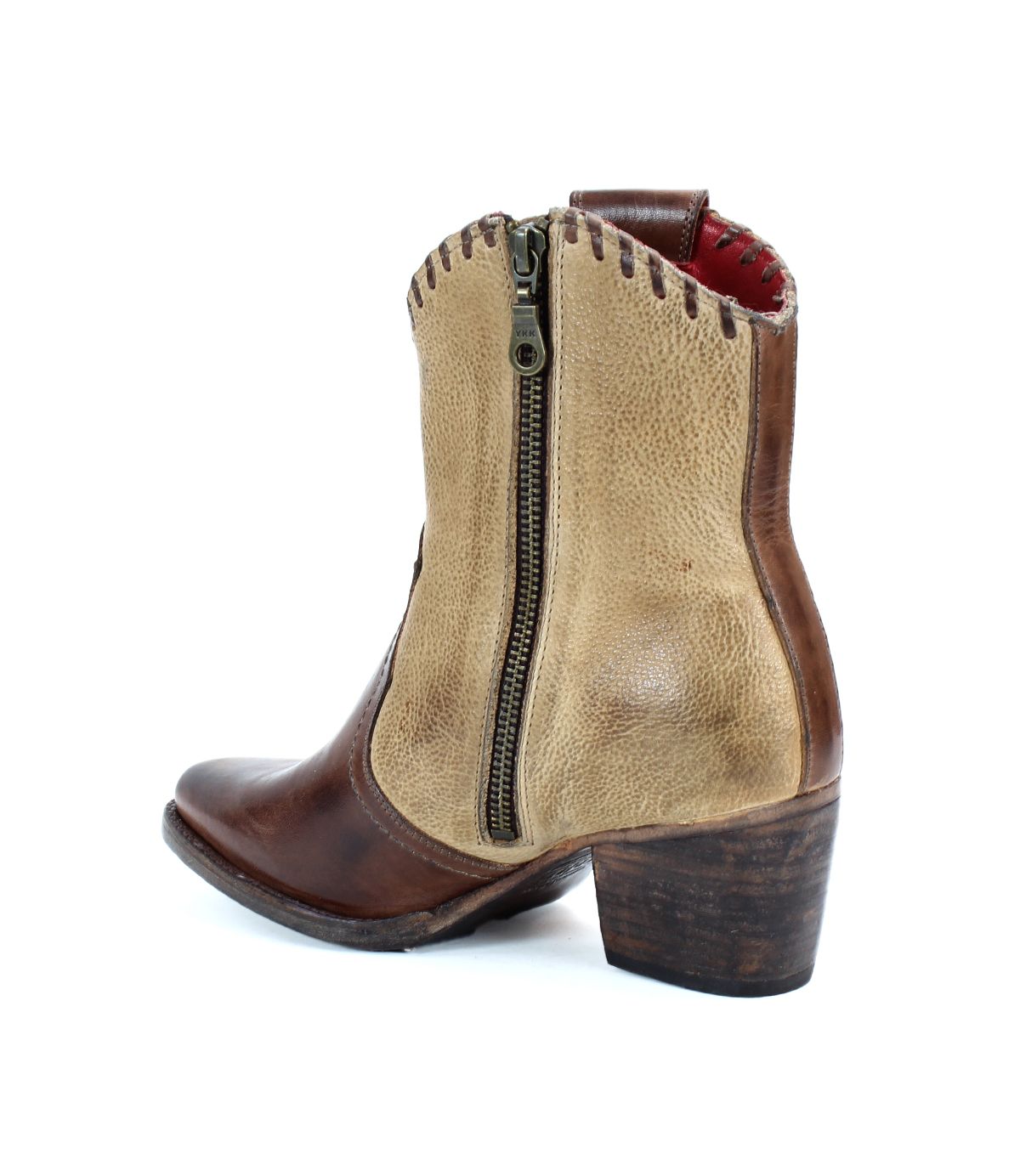 The Baila II by Bed|Stü is a brown and tan leather ankle boot featuring artisanal construction, a side zipper, rounded toe, and medium stacked heel, shown against a white background.