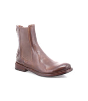 The Barfly Chelsea boot by Bed|Stü is crafted from brown Italian leather, featuring elastic side panels and a low heel, shown on a white background.