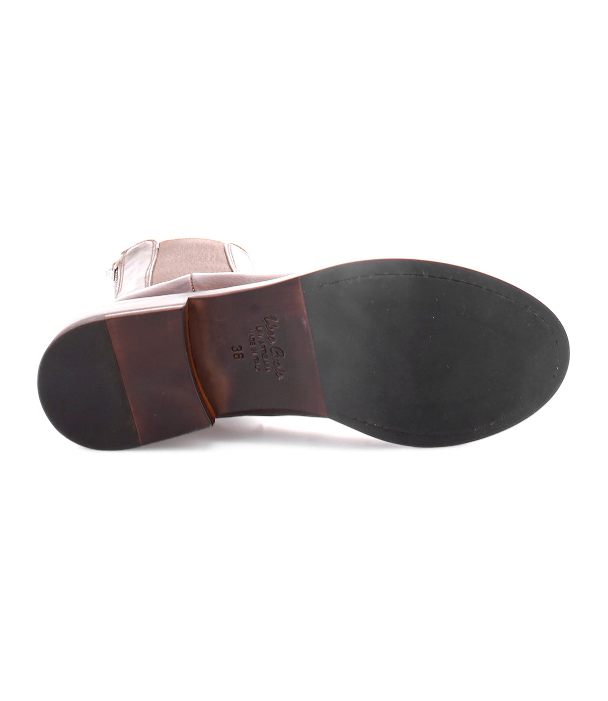 Photo showing the sole of the Barfly brown Italian leather boot by Bed|Stü, featuring a smooth black bottom and clearly visible size and brand markings near the heel—a refined detail emblematic of quality Chelsea boots.